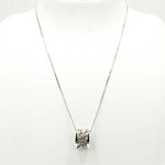 Hand-knitted silver single top